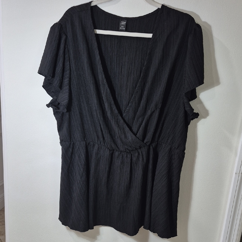 Elegant Black Wrap Blouse - Picture 2 of 10